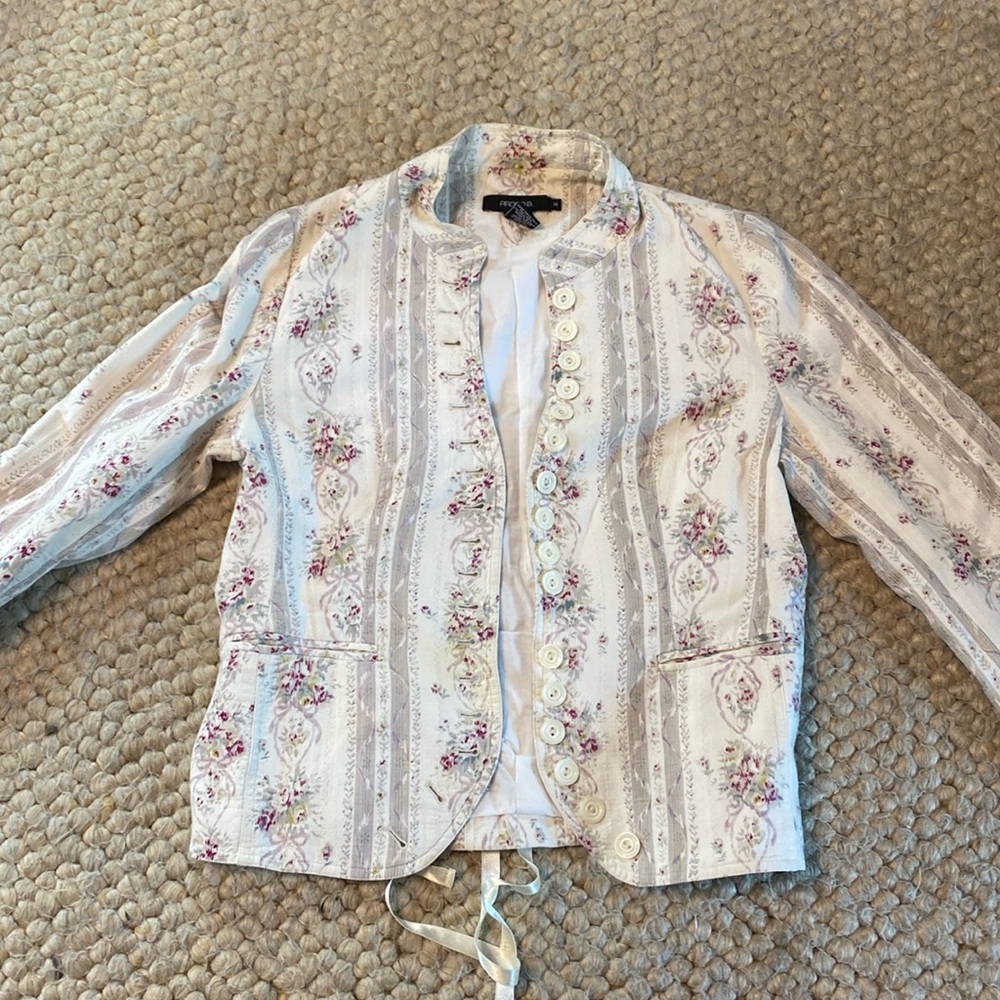Fun patterned button down jacket with lace tie in back